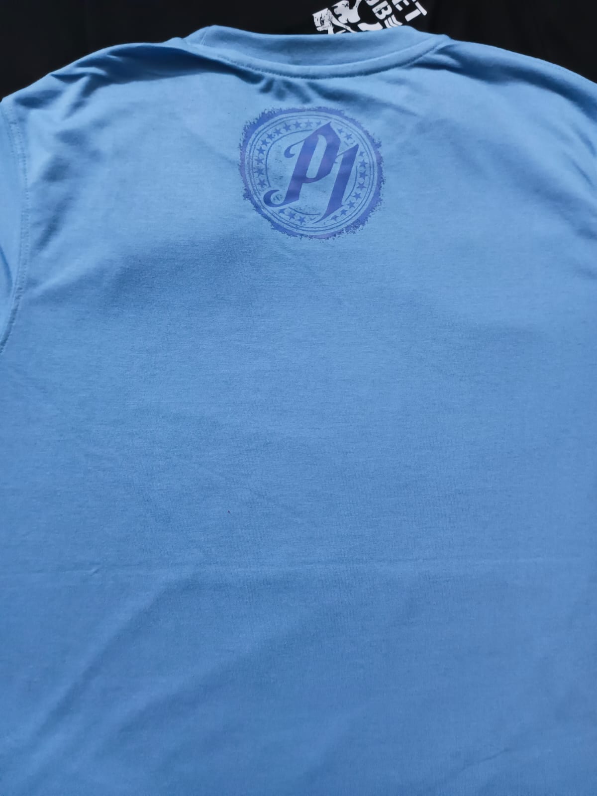 WWE AJ STYLES “THE HOUSE THAT AJ BUILT” T-SHIRT (Light Blue)